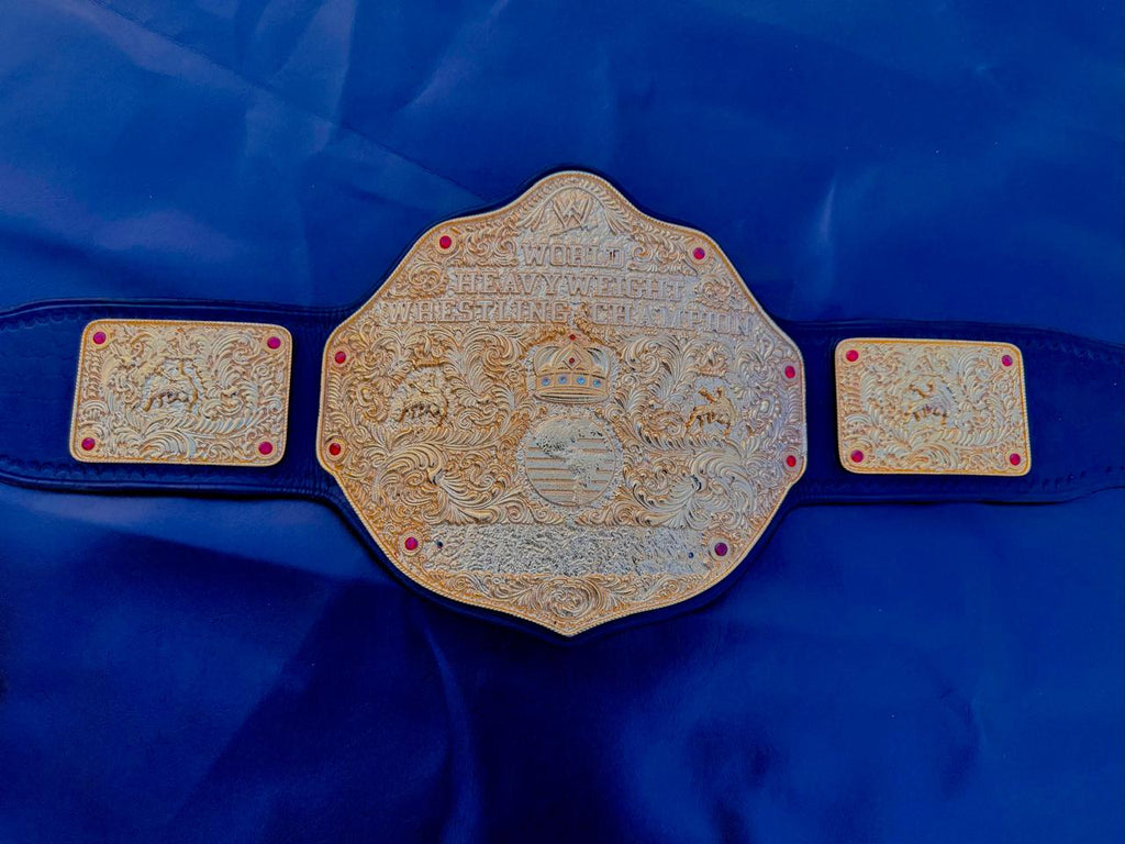 Premium CNC 3D Big Gold World Heavyweight Championship replica title belt featuring 24k gold plated plates and a high-quality leather strap.