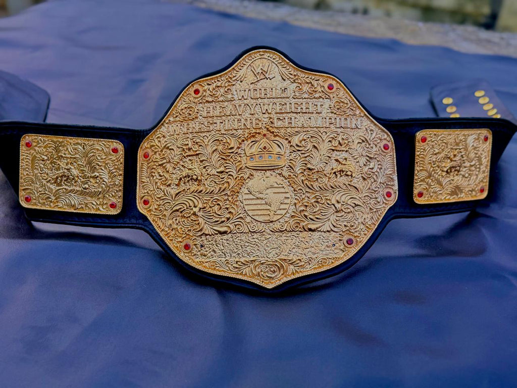 Premium CNC 3D Big Gold World Heavyweight Championship replica title belt featuring 24k gold plated plates and a high-quality leather strap.