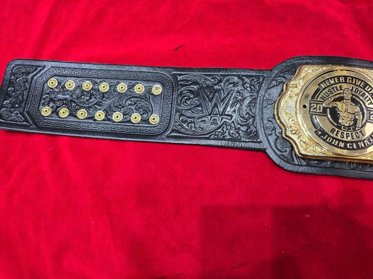Premium World Heavyweight Championship belt, featuring customized side plates celebrating John Cena's 17th championship