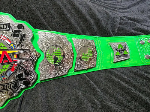 4MM Zinc TNA International Heavyweight Championship Title Belt with Custom Green Strap Adult Size.