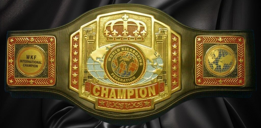 Ottoman Belts World Kickboxing Federation championship belt with gold-tone finish, red enamel, and synthetic leather.