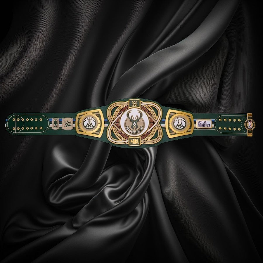 Wrestling championship belt with gold and green design on a white background