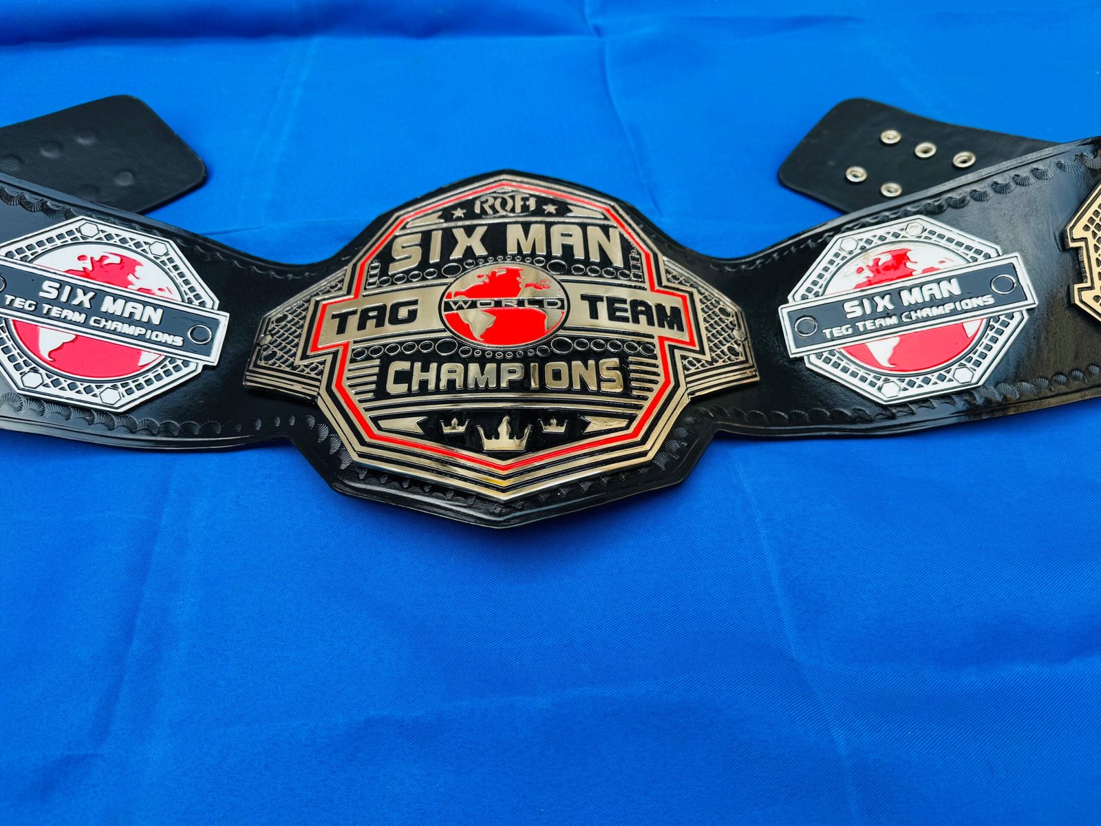 FullSizeRender_e4a86877-f4b4-4052-94c6-dda133af3ea6 ROH Six Man Tag Team Championship Replica Belt – 4mm Zinc Plates | 24K Gold Plated | Hand Tooled Genuine Leather Adult size wrestling belt