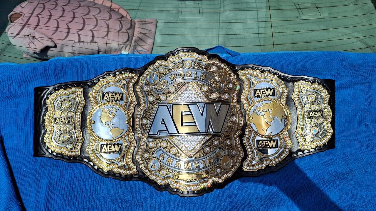 b_6_7633bcc4-2d25-4661-bd22-02e2c27d8e1c Premium CNC 3D AEW World Championship Replica Belt | 4mm Zinc – Silver and Gold Plated with 4-Layer Stacked Design