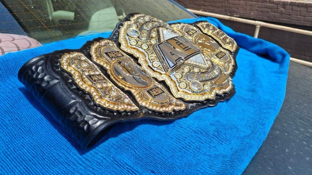 b_7_fdf9a3b0-886f-439e-9c2d-8b568547b767 Premium CNC 3D AEW World Championship Replica Belt | 4mm Zinc – Silver and Gold Plated with 4-Layer Stacked Design - Image 7
