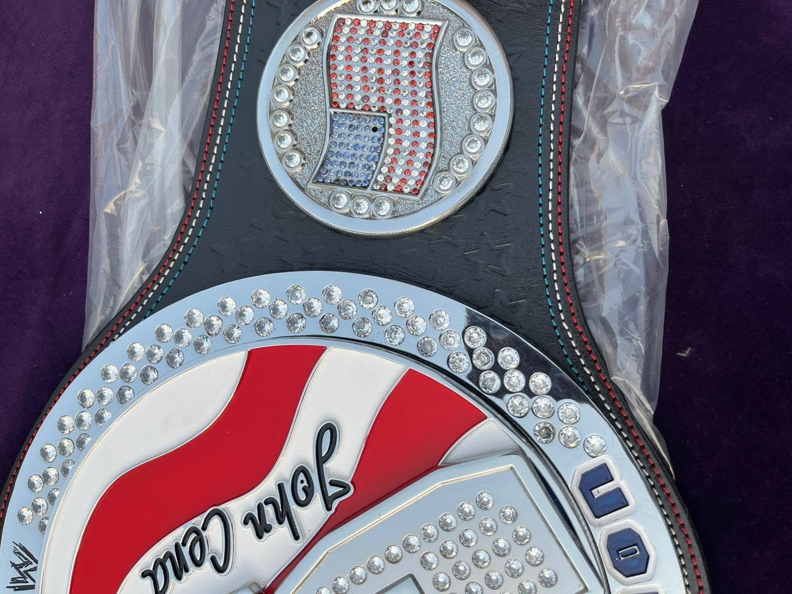 ottoman-belts-john-cena-spinner-belt Ottoman Belts John Cena US spinner replica belt featuring 4mm brass plates, cubic zirconia stones, and cowhide leather.